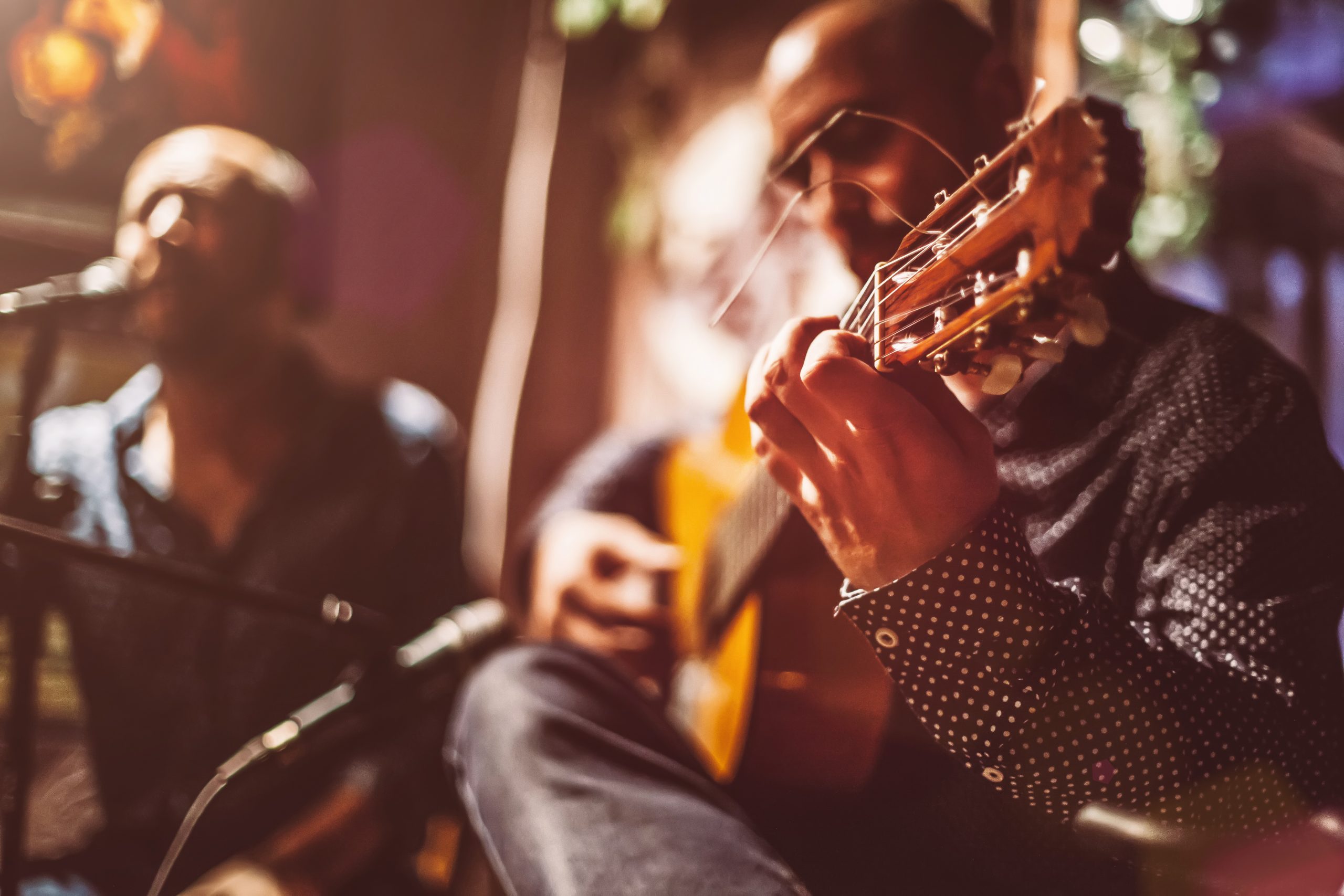 people playing guitar